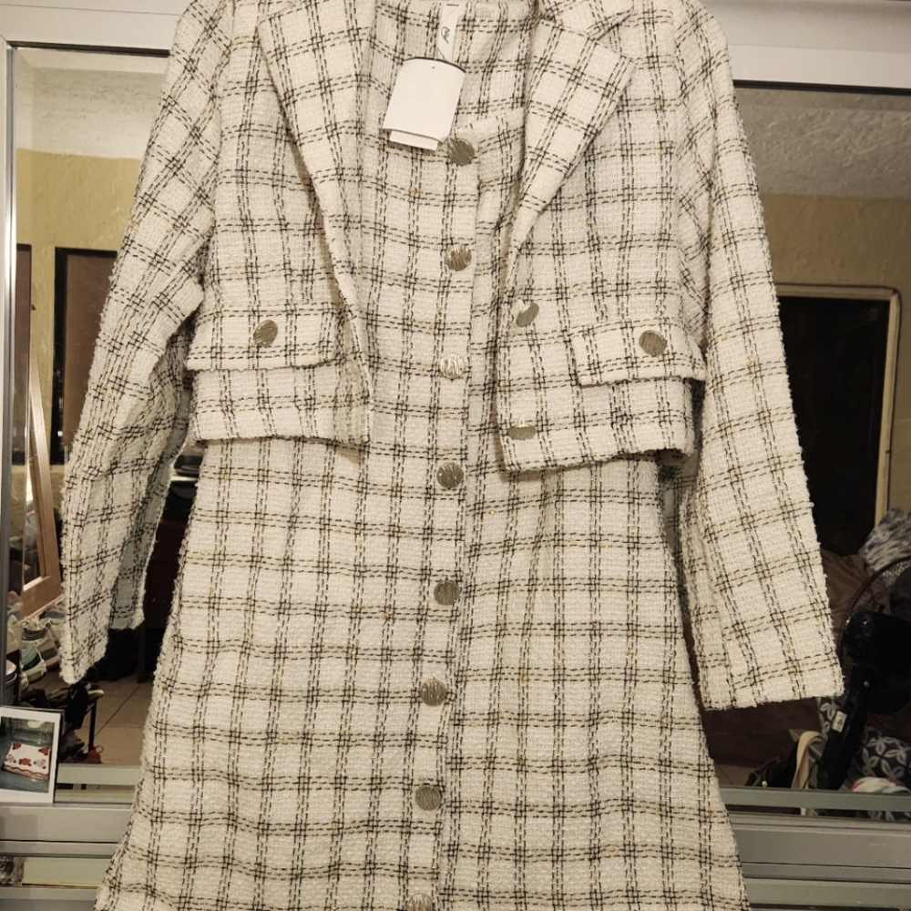 A cream w/ black and gold 2 piece set from NY collections; size small